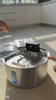 Filling the Kilde fountain from a pitcher, tapping the sensor, golden retriever drinks